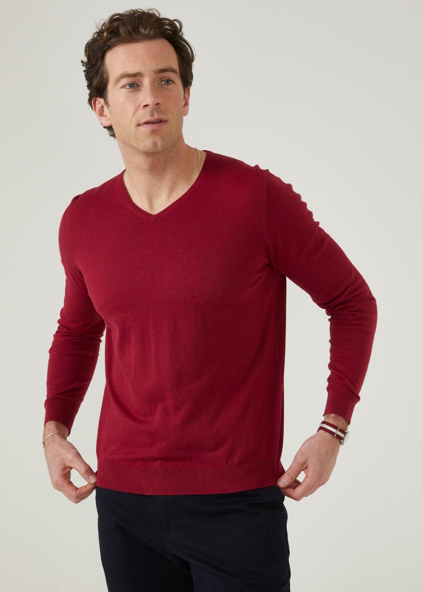 cotton cashmere jumper with a vee neck in claret red.