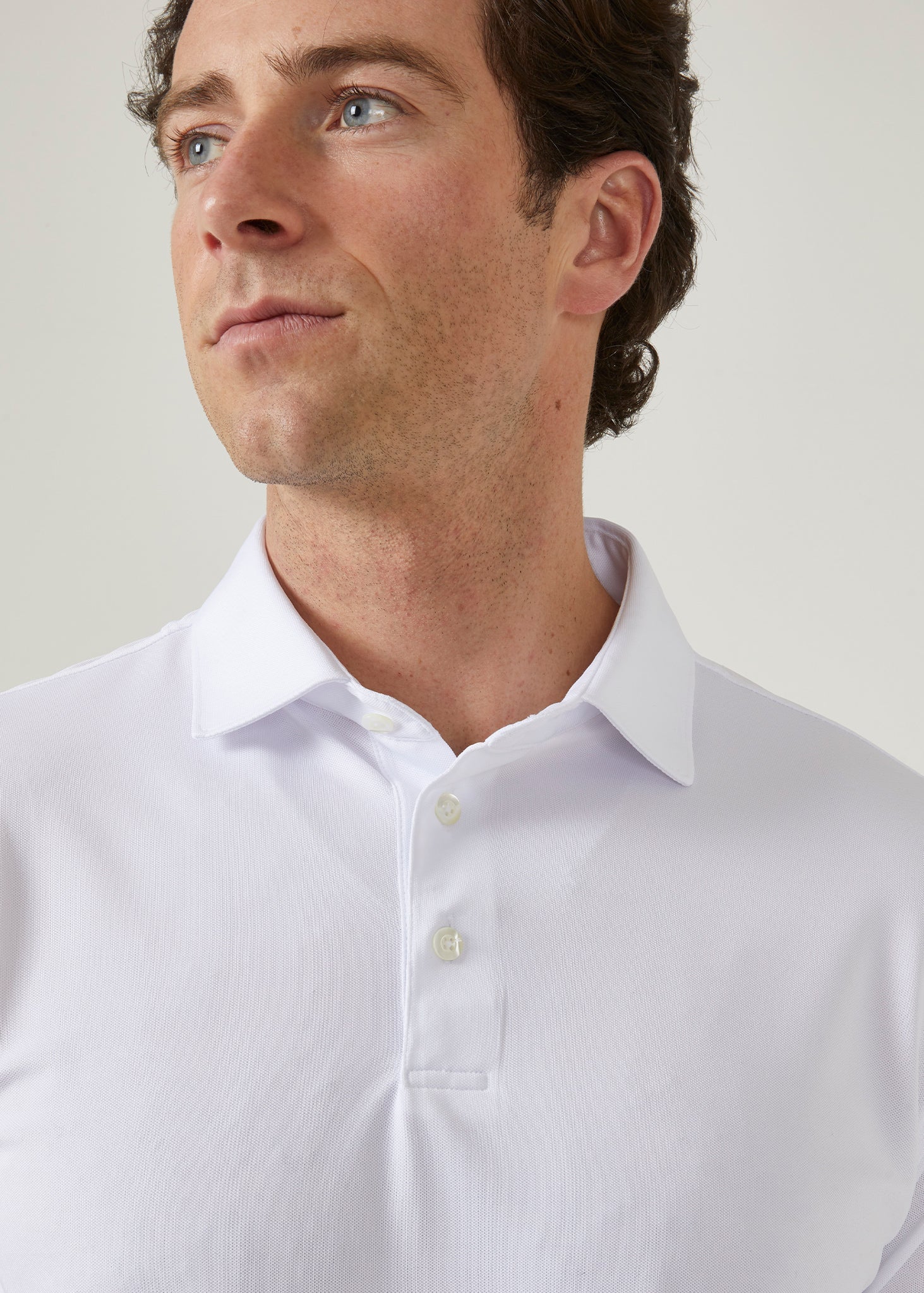 Men's 3 button polo shirt in white.